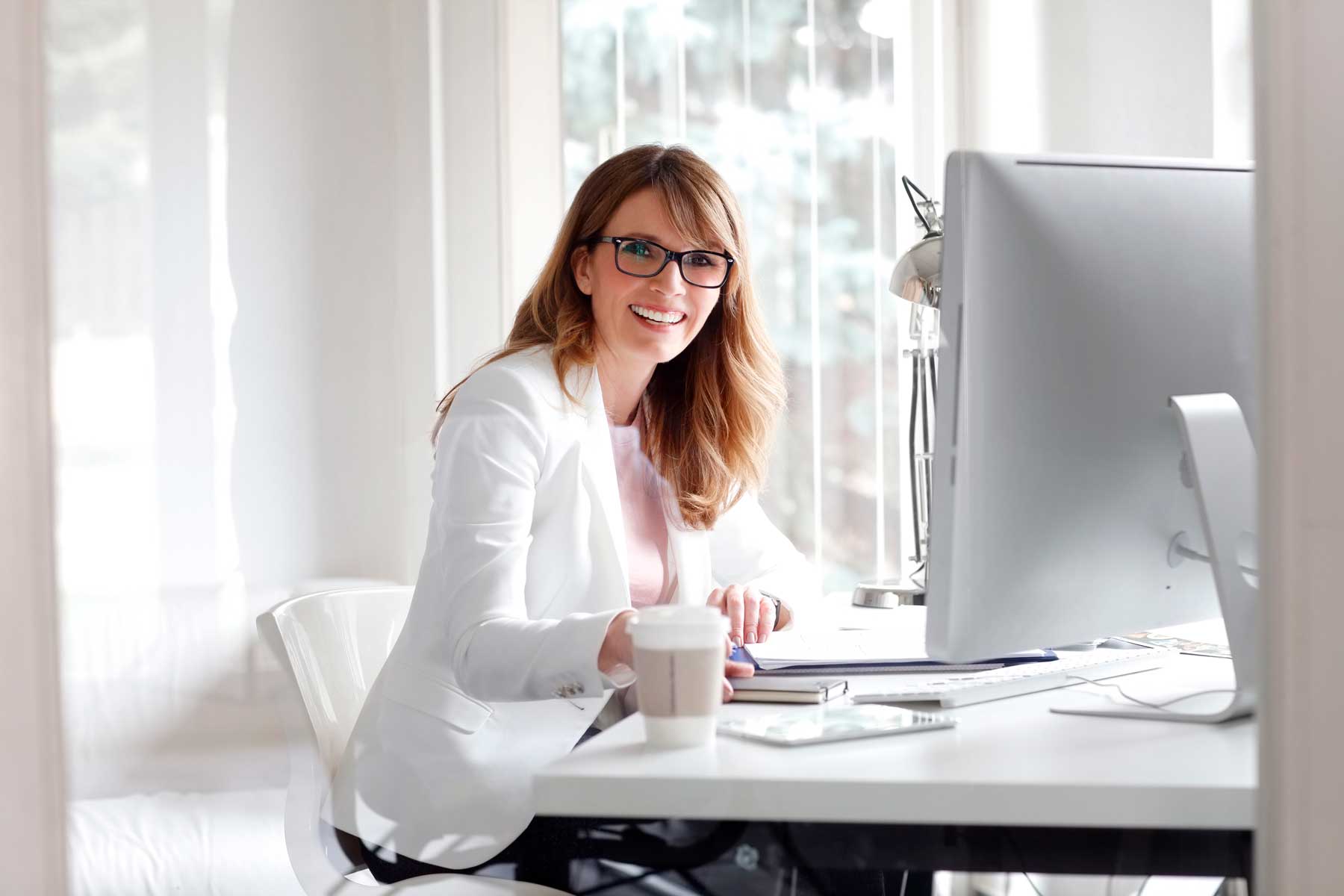 Businesswoman working at office 517237120 3869x2579