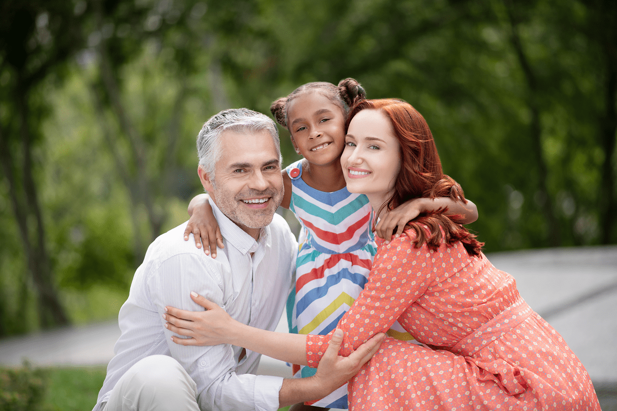 loving foster parents hugging their lovely dark sk 2024 10 18 05 15 05 utc 1 min